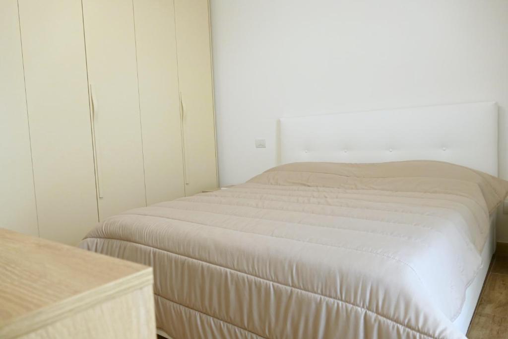 Postel nebo postele na pokoji v ubytování Relux Capurso