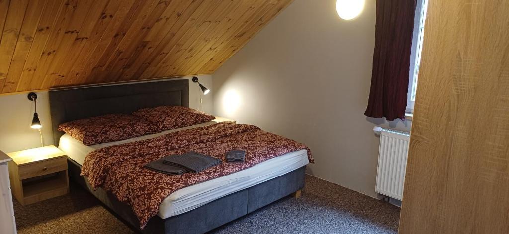 Postel nebo postele na pokoji v ubytování PENZION PARMA