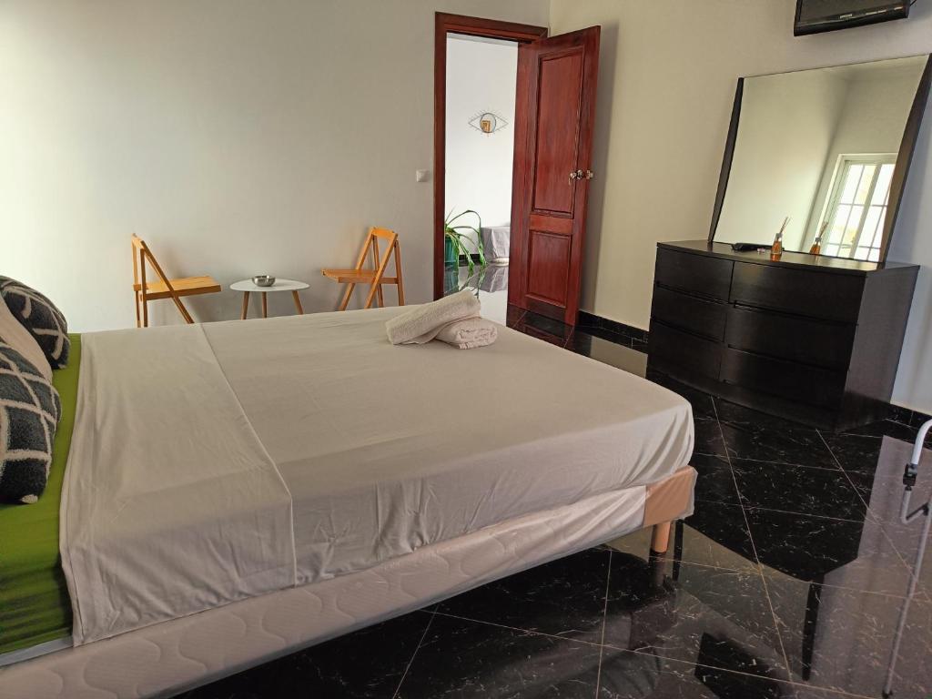 Postel nebo postele na pokoji v ubytování Casa Miami