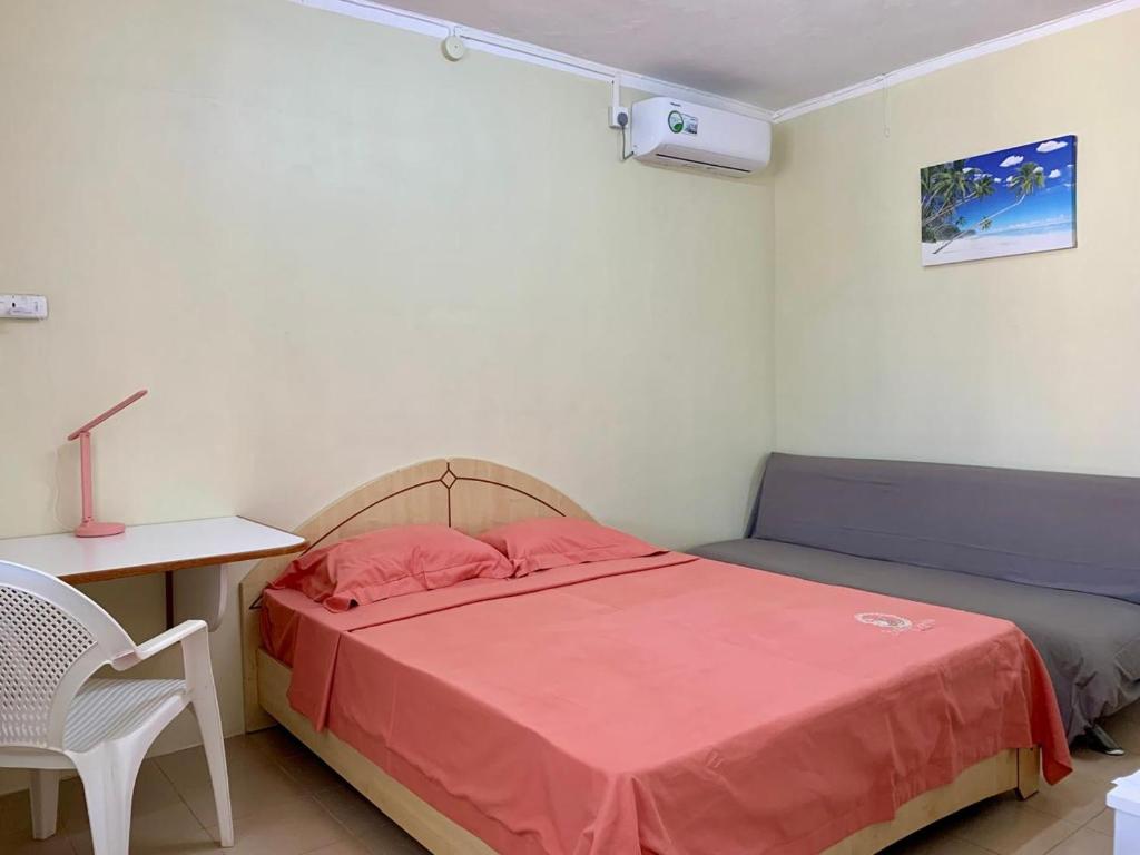 Postel nebo postele na pokoji v ubytování Oasis 2