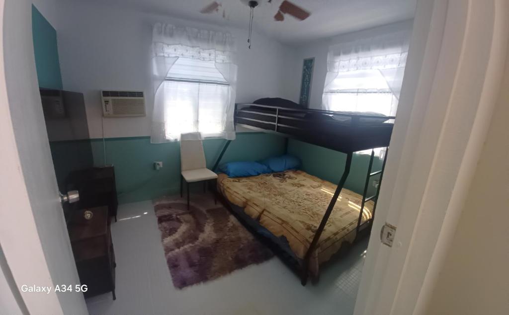 Postel nebo postele na pokoji v ubytování Rooster Run Guest House offers Vieques travelers newly furnished quaint affordable airconditioned rooms and only steps from the Ferry and nearby beaches