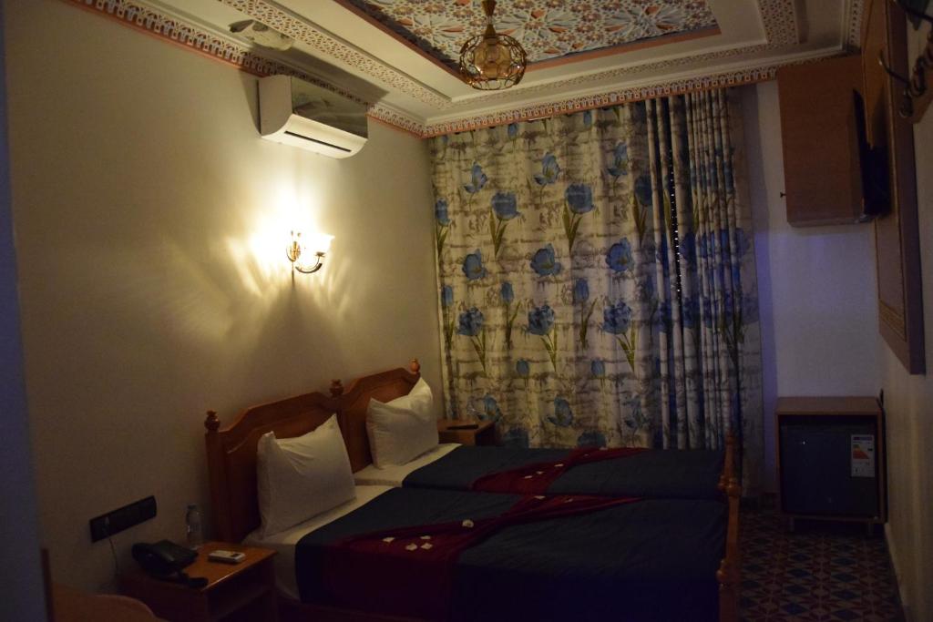 Postel nebo postele na pokoji v ubytování Diyafat Bladi
