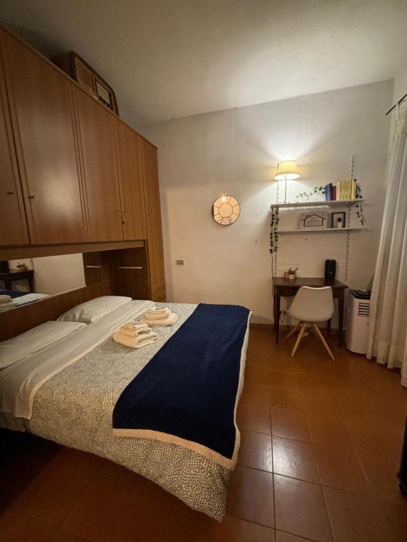 A bed or beds in a room at La dolce Frascati Home