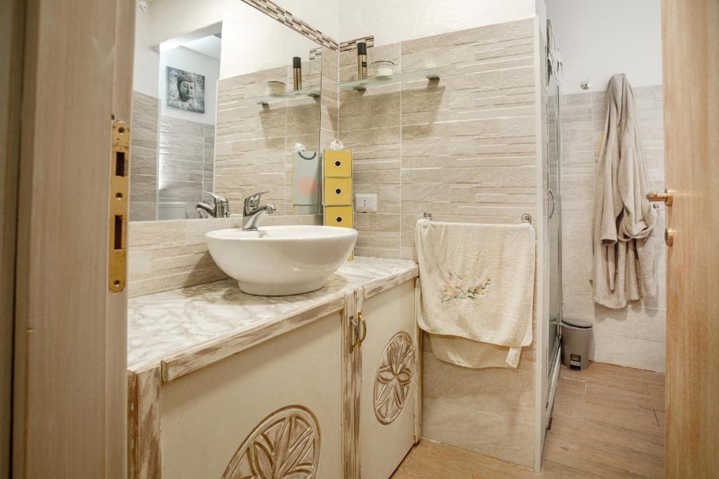 Koupelna v ubytování Locanda Domus De Vida