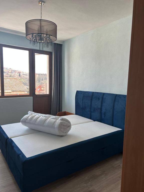 A bed or beds in a room at Didi House