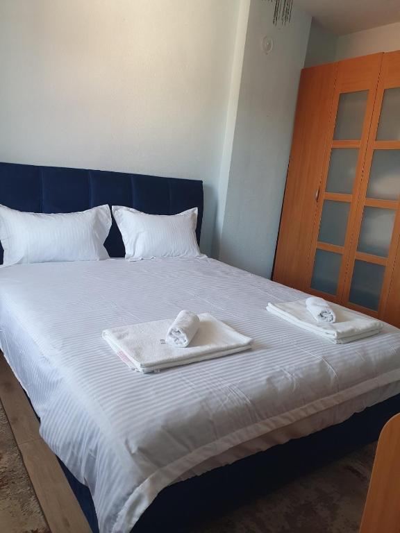 A bed or beds in a room at Didi House
