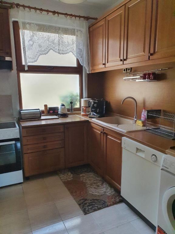 A kitchen or kitchenette at Didi House