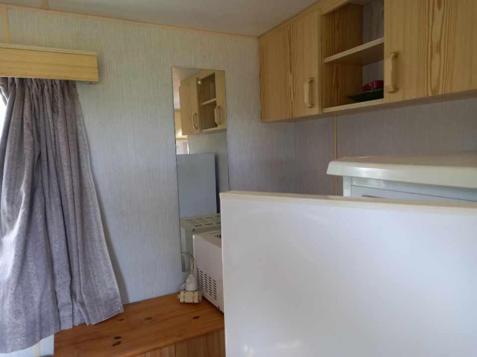 Kuchyň nebo kuchyňský kout v ubytování Mobil-home charmant à 10 minutes de la mer