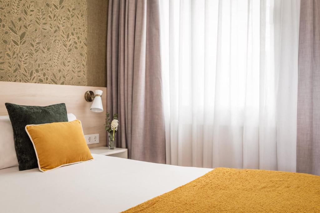 Postel nebo postele na pokoji v ubytování BYPILLOW House