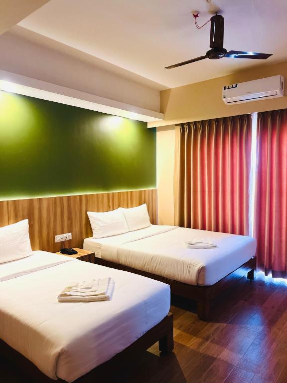 Katil atau katil-katil dalam bilik di Hotel Quest