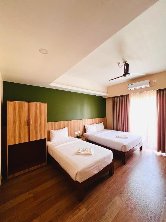 Katil atau katil-katil dalam bilik di Hotel Quest