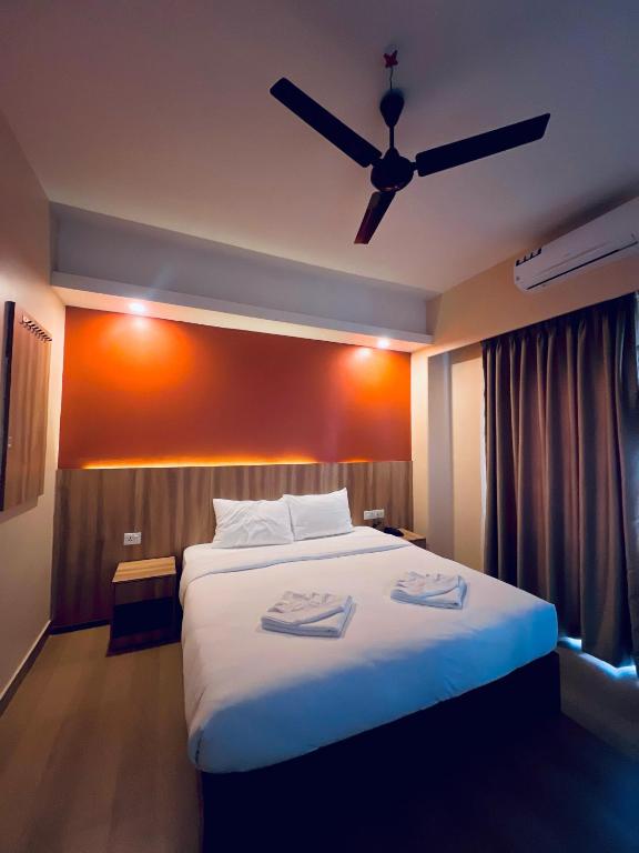 Katil atau katil-katil dalam bilik di Hotel Quest