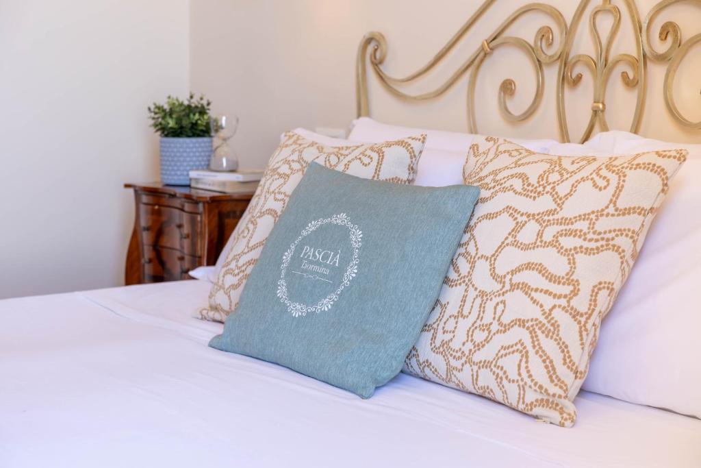 A bed or beds in a room at Pascià Cappuccini