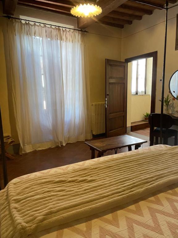 Postel nebo postele na pokoji v ubytování Locanda Antico Borgo