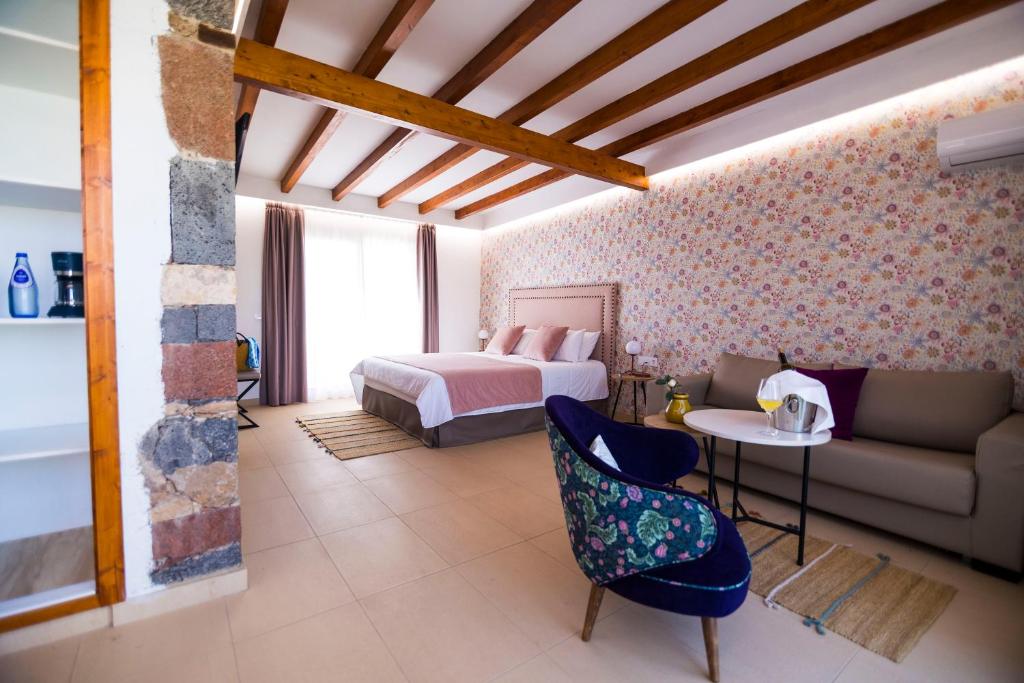 Posteľ alebo postele v izbe v ubytovaní Hotel Rural Rosario Martin