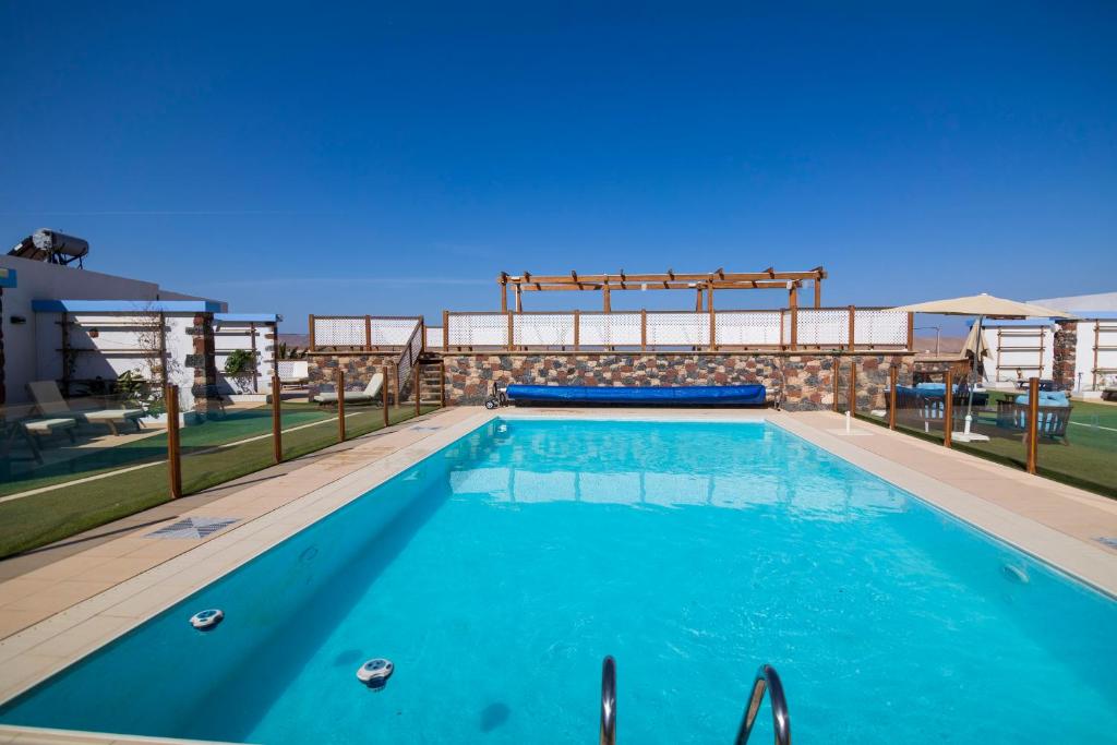 Bazén v ubytovaní Hotel Rural Rosario Martin alebo v jeho blízkosti