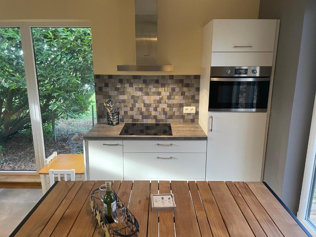 Kuchyň nebo kuchyňský kout v ubytování Chalet & Spa Nora