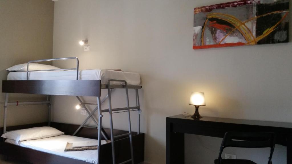 Voodi või voodid majutusasutuse Hostel Mosaic toas