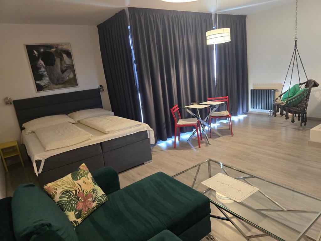 A bed or beds in a room at SUBARX centrum Nitra