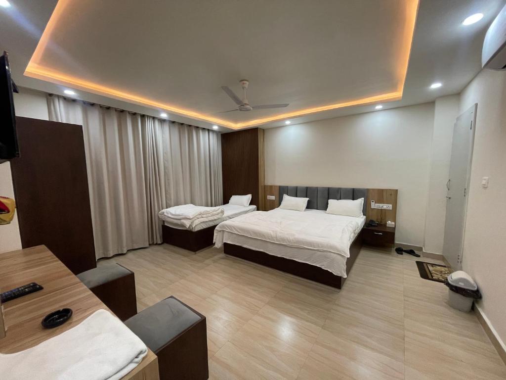 Postel nebo postele na pokoji v ubytování Hotel Faben Inn