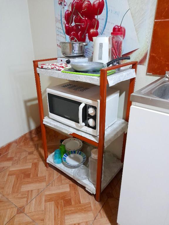 Kuchyň nebo kuchyňský kout v ubytování Travel House