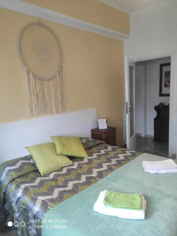 Postel nebo postele na pokoji v ubytování Casa di Ana