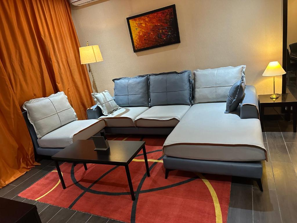 Posezení v ubytování Rich-Bridge Hotel