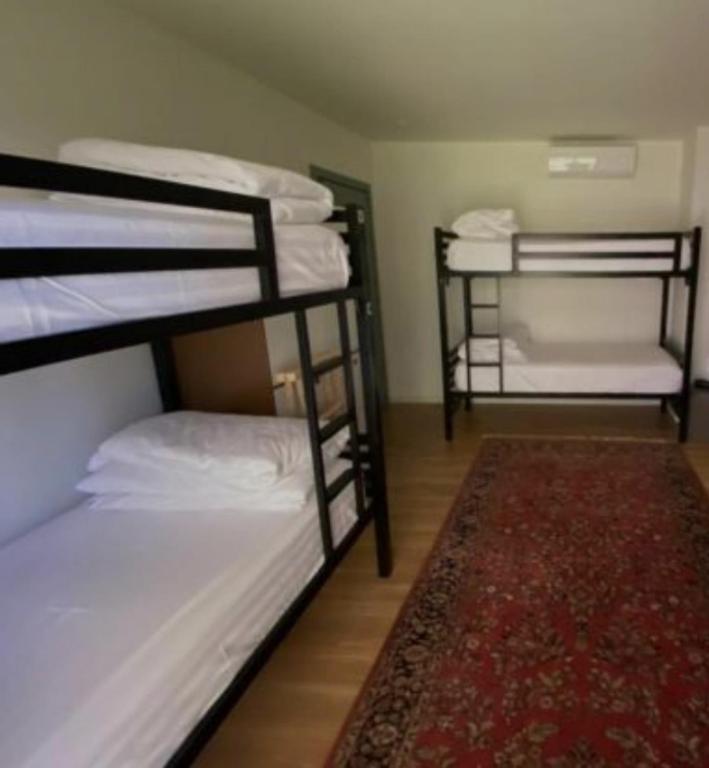 Postel nebo postele na pokoji v ubytování Tofu Guesthouse