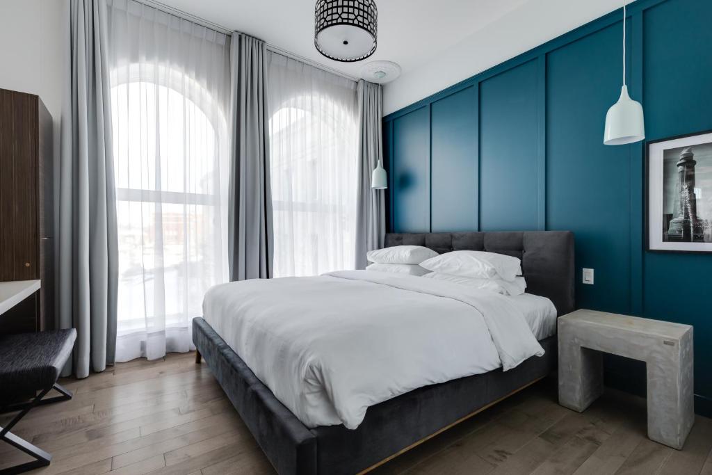 Postel nebo postele na pokoji v ubytování Hotel Oui GO!