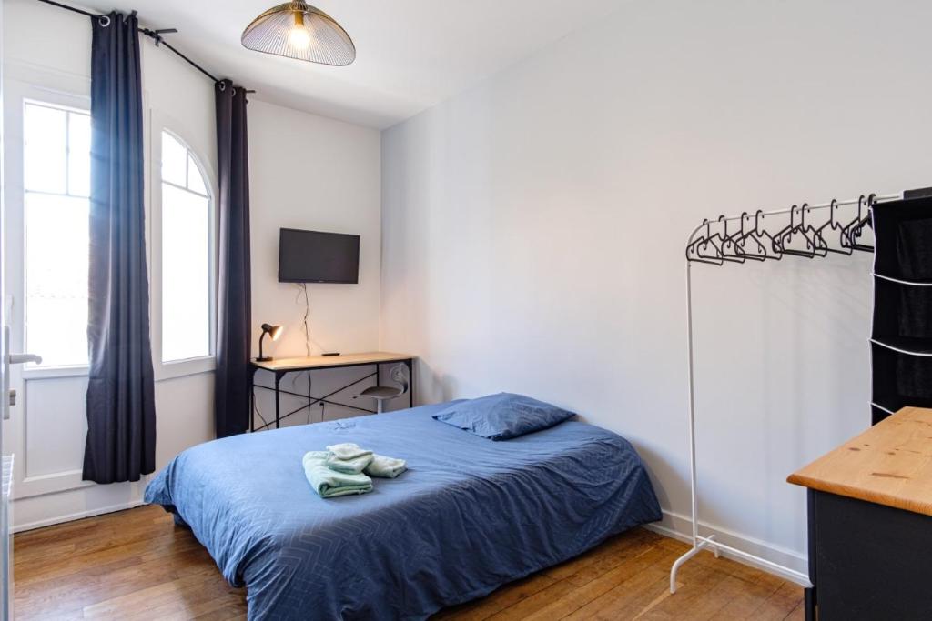Postel nebo postele na pokoji v ubytování Chambre dans colocation - Valence -