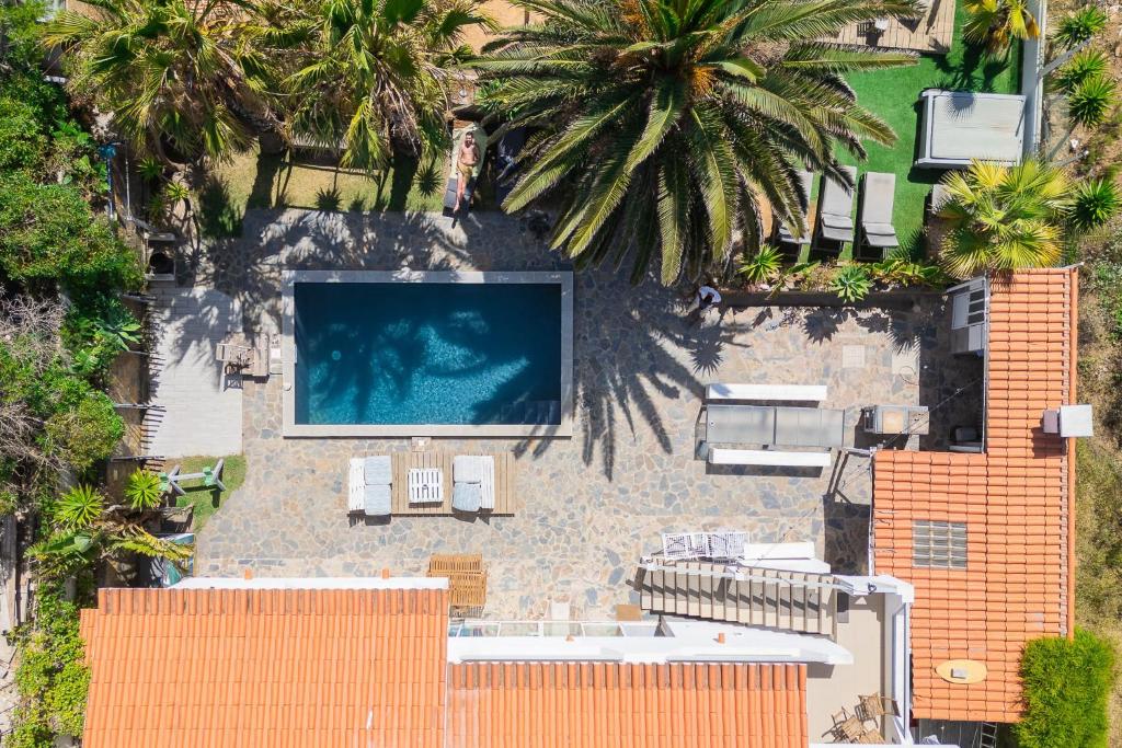 Piscina de la sau aproape de Living Lodge Portugal