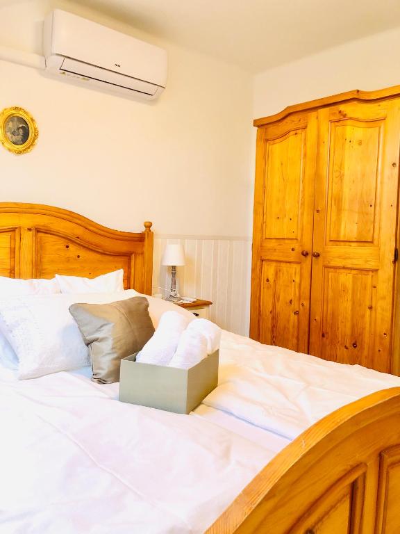 Postel nebo postele na pokoji v ubytování Lux Apartman Villa