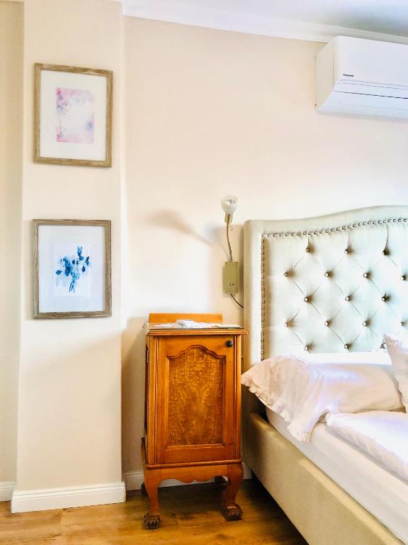 Postel nebo postele na pokoji v ubytování Lux Apartman Villa