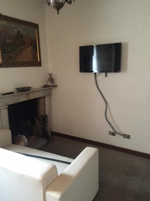 Telewizja i/lub zestaw kina domowego w obiekcie Appartamento Santi