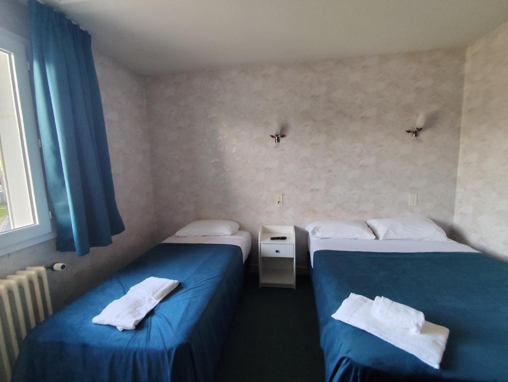 Postel nebo postele na pokoji v ubytování A L'Orée du Bois chez Doudou&Lolo