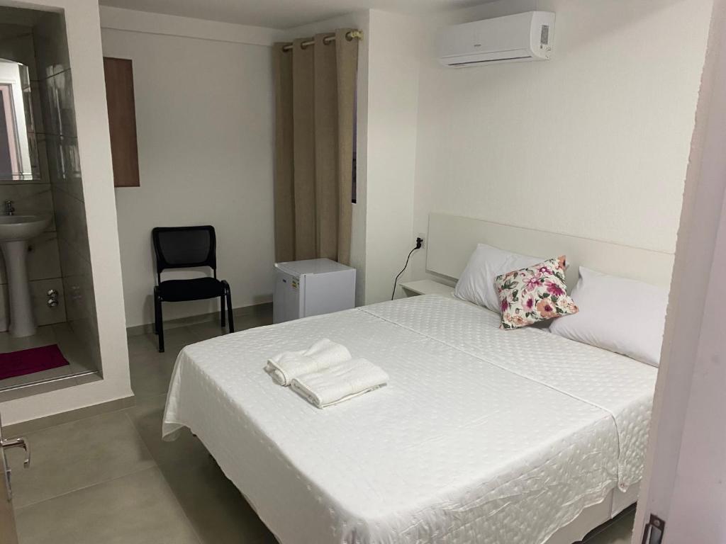 Postel nebo postele na pokoji v ubytování Hotel Sur Brasil