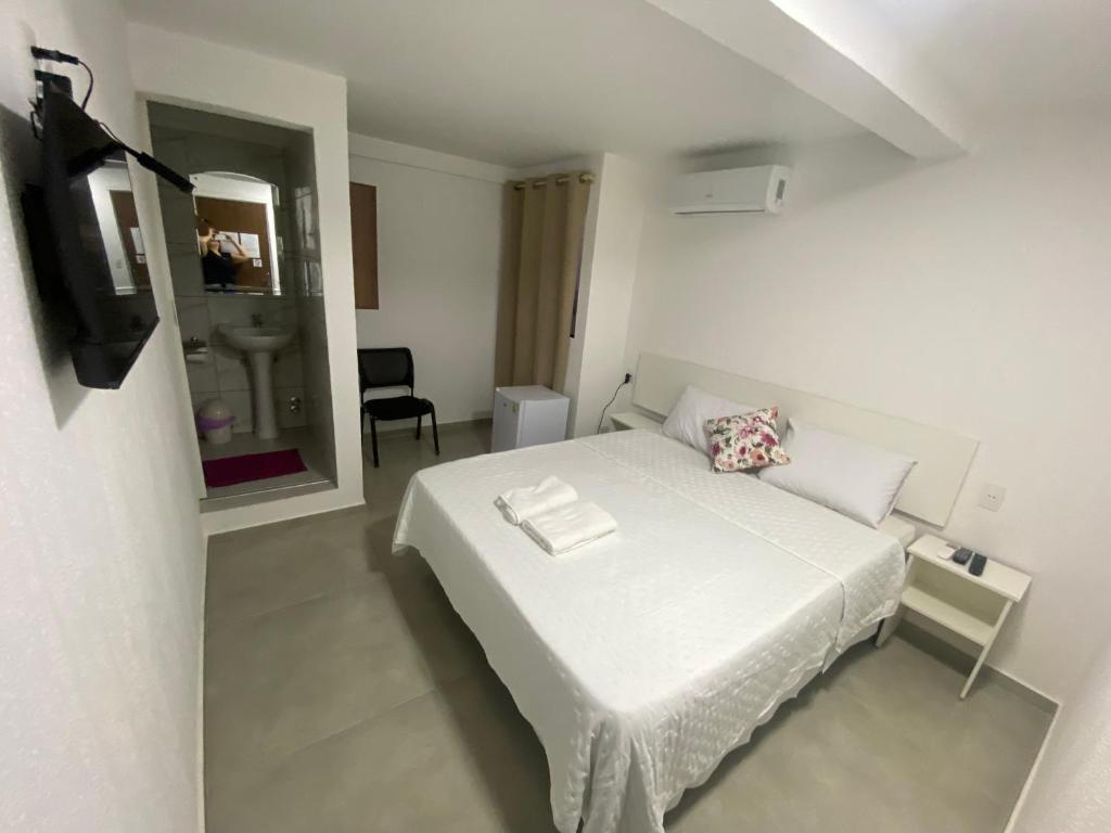 Postel nebo postele na pokoji v ubytování Hotel Sur Brasil