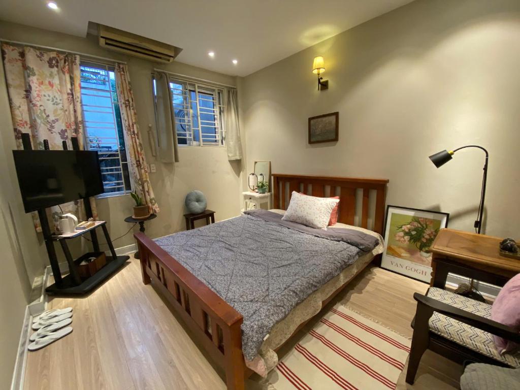 Postel nebo postele na pokoji v ubytování Quynh Nest Homestay