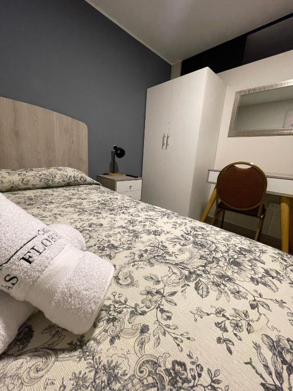 Postel nebo postele na pokoji v ubytování Casa Las Flores Ica