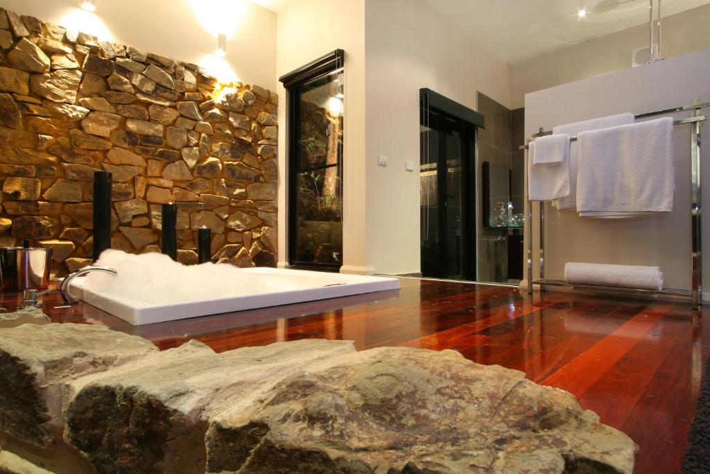 Postel nebo postele na pokoji v ubytování Kudos Villas - Hepburn Springs