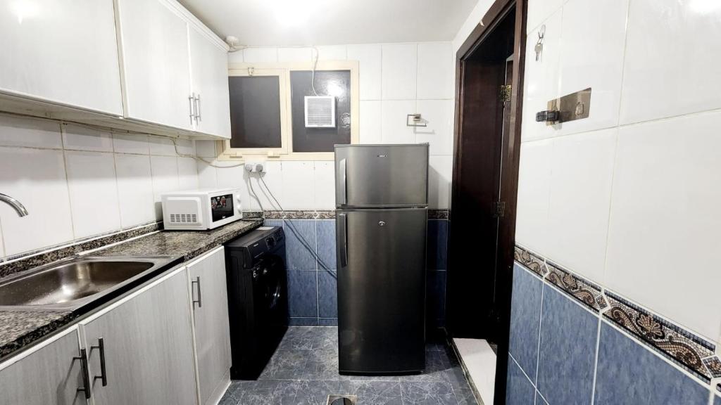 Kuchyň nebo kuchyňský kout v ubytování harmony property
