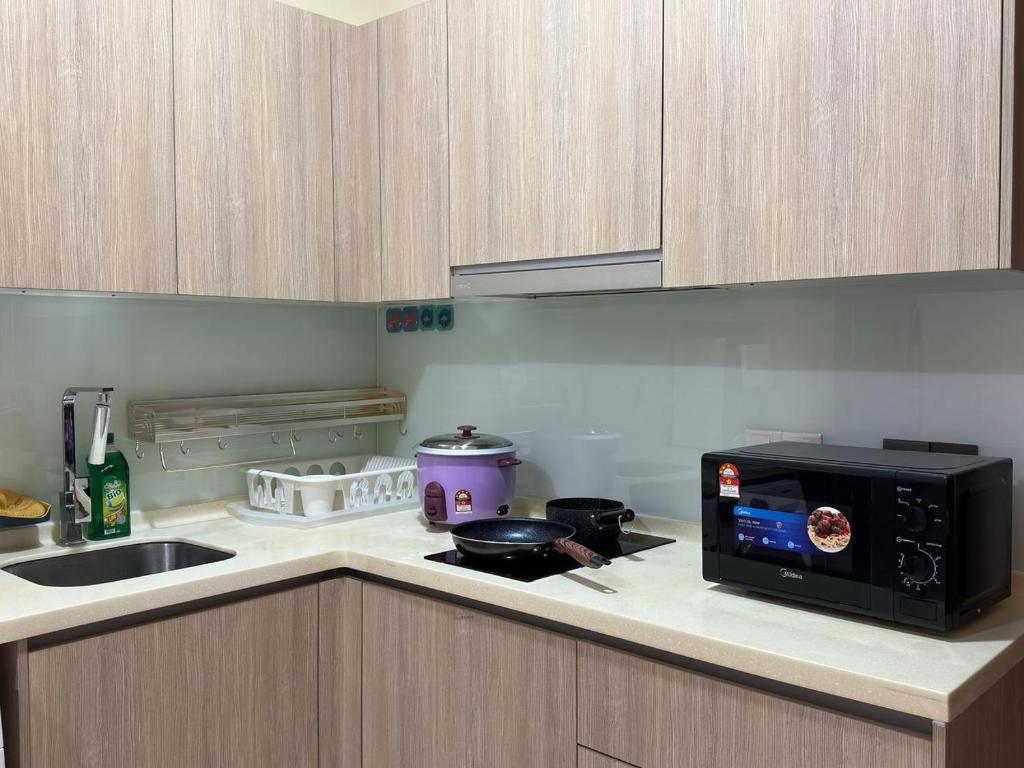 Kuchyň nebo kuchyňský kout v ubytování Leisure Home-1Bedroom