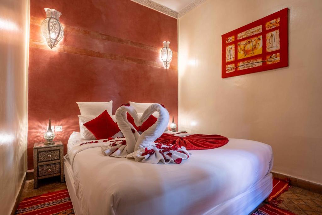 Postel nebo postele na pokoji v ubytování Riad Alaka