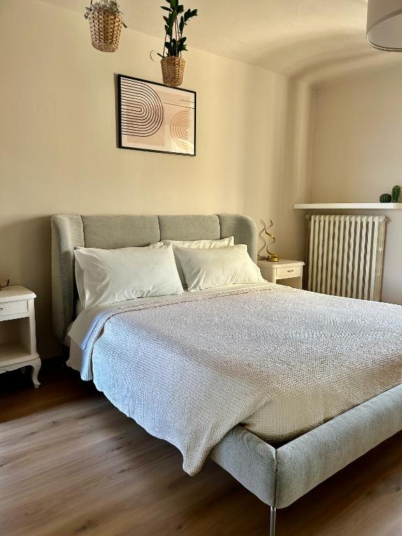 Postel nebo postele na pokoji v ubytování Cascina Montè
