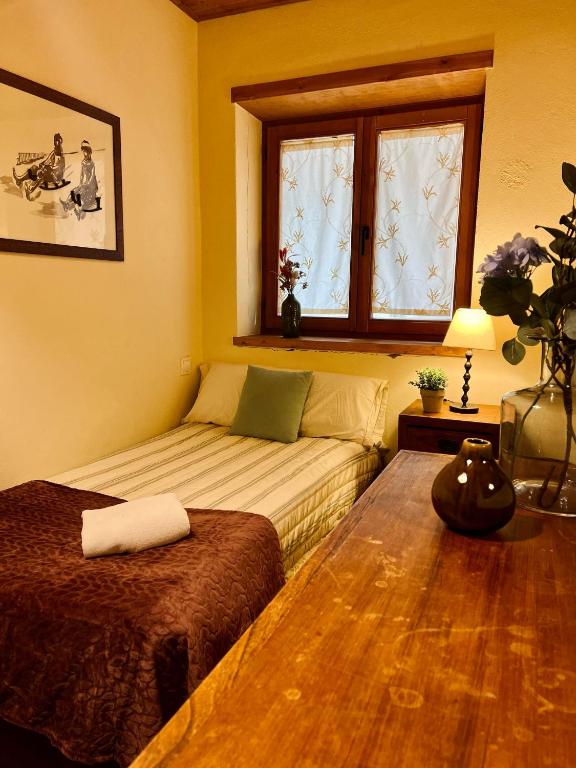 Postel nebo postele na pokoji v ubytování Vistas Sant Climent Taüll