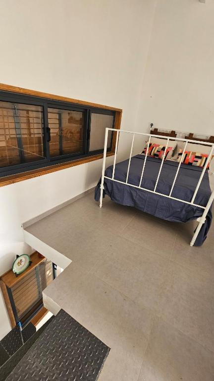 Postel nebo postele na pokoji v ubytování Serene Escape in Porto Madeira
