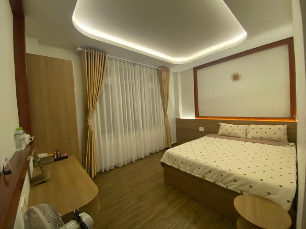 Postel nebo postele na pokoji v ubytování Mai An Home