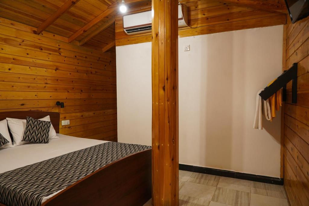 Postel nebo postele na pokoji v ubytování Blue Beach Hotel Trinco