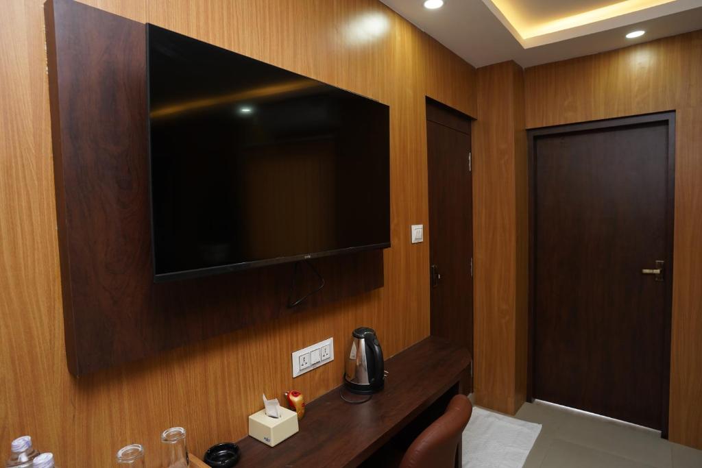 TV a/nebo společenská místnost v ubytování Hotel Faben Inn