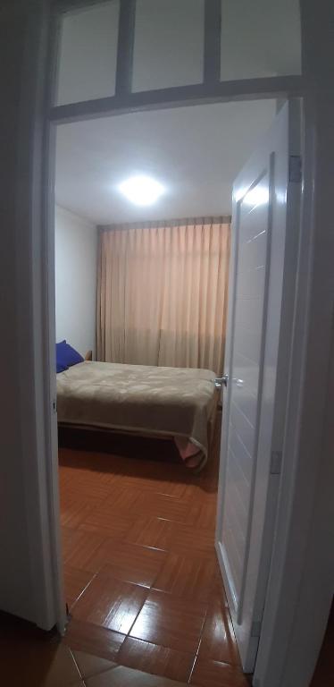 Postel nebo postele na pokoji v ubytování Urpi Wasi Backpackers
